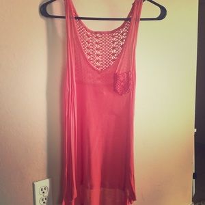 Crocheted coral tank top.